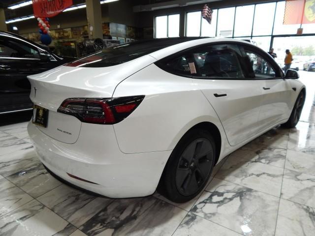 used 2022 Tesla Model 3 car, priced at $23,721