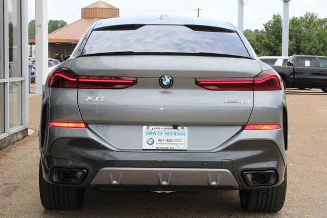 new 2025 BMW X6 car, priced at $88,075