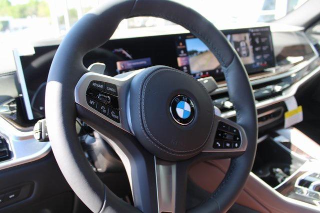 new 2025 BMW X6 car, priced at $83,210