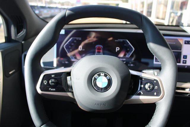 new 2026 BMW iX car, priced at $94,195