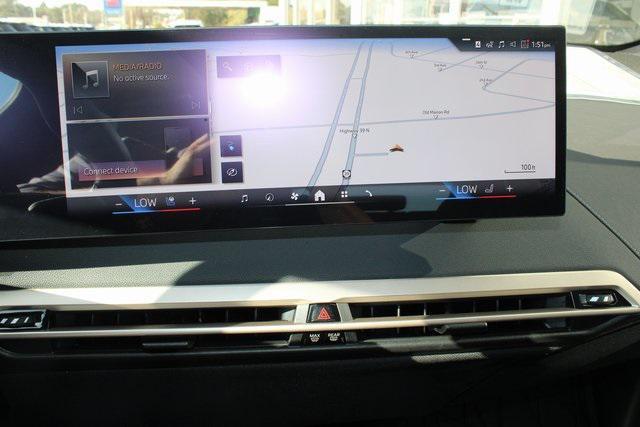 new 2026 BMW iX car, priced at $94,195