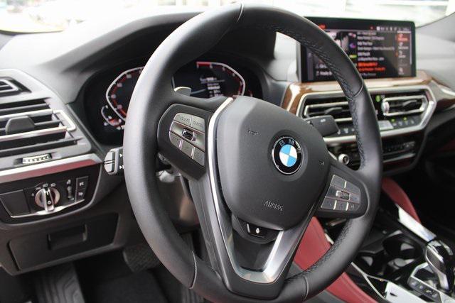 used 2025 BMW X4 car, priced at $52,133