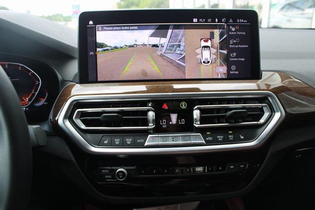 used 2025 BMW X4 car, priced at $52,133