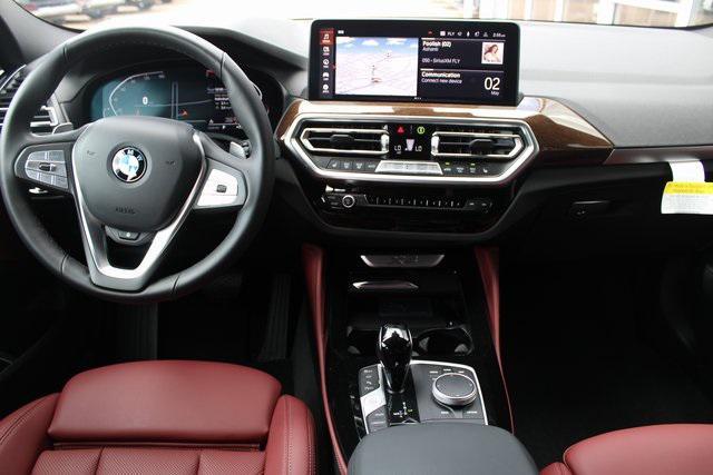 used 2025 BMW X4 car, priced at $52,133