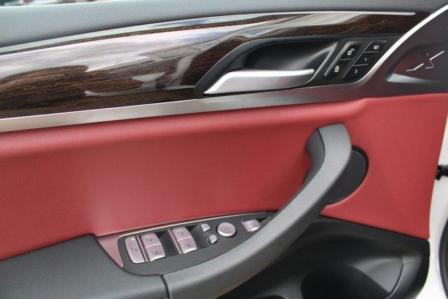 used 2025 BMW X4 car, priced at $52,133
