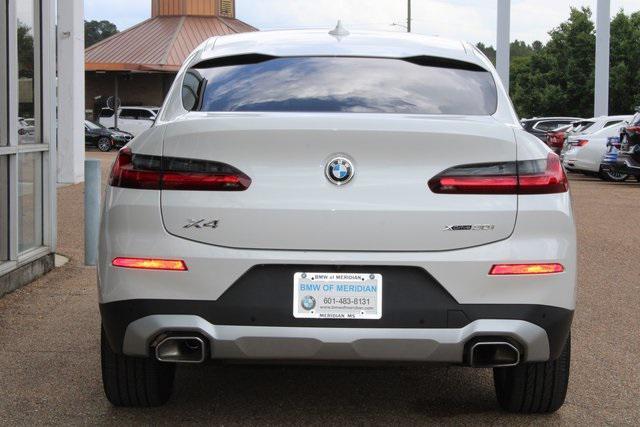 used 2025 BMW X4 car, priced at $52,133