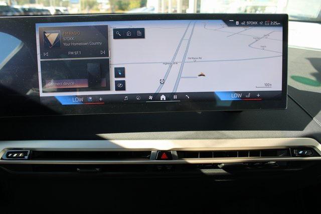 new 2026 BMW iX car, priced at $82,270