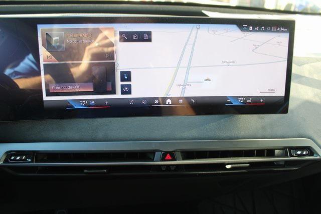 new 2026 BMW iX car, priced at $100,845