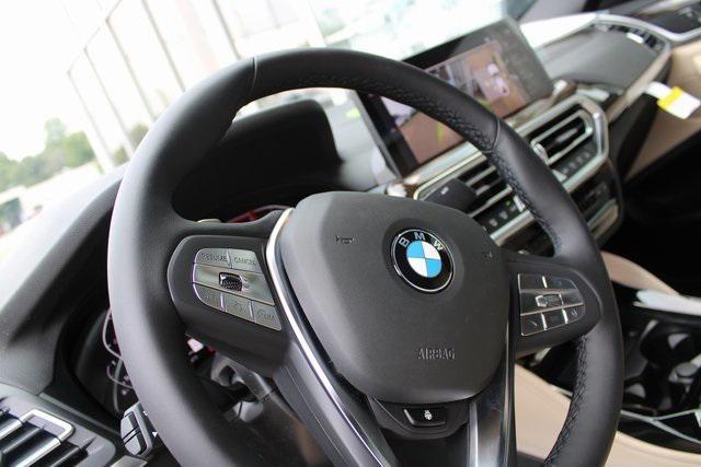 used 2025 BMW X4 car, priced at $49,639