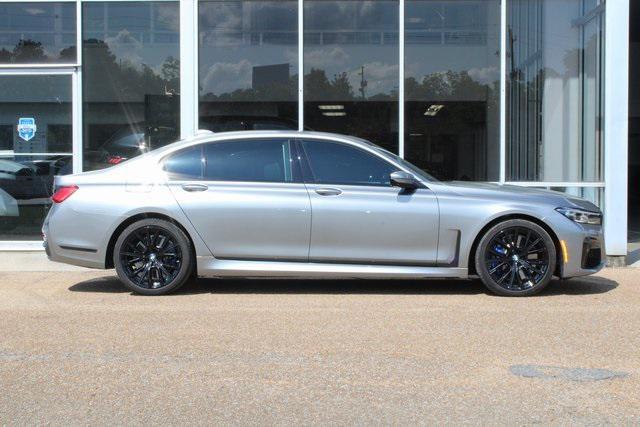used 2022 BMW 750 car, priced at $51,864