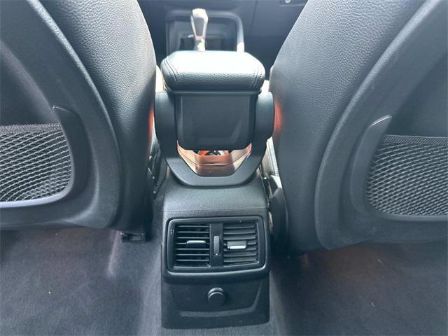 used 2018 BMW X1 car, priced at $18,895