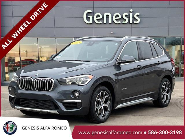 used 2018 BMW X1 car, priced at $18,672