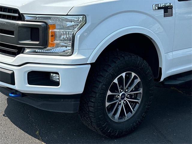 used 2018 Ford F-150 car, priced at $23,995