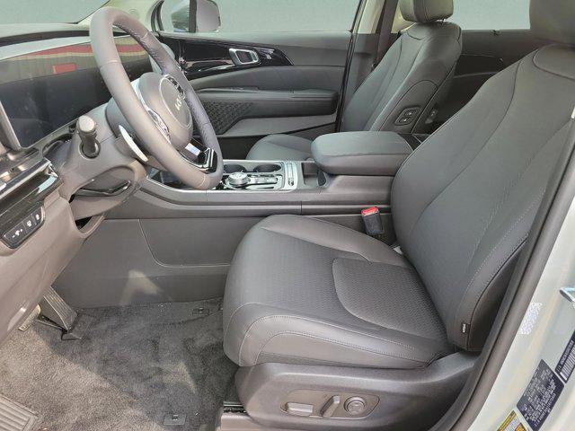 new 2025 Kia Carnival Hybrid car, priced at $54,060