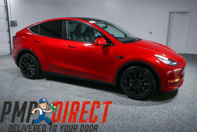 used 2023 Tesla Model Y car, priced at $32,995