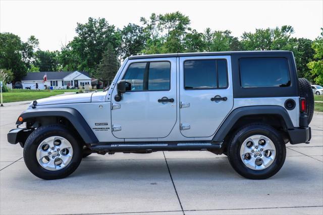 used 2014 Jeep Wrangler Unlimited car, priced at $17,500