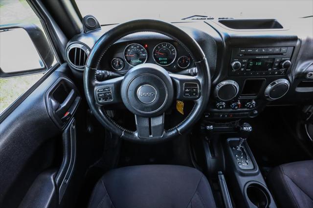 used 2014 Jeep Wrangler Unlimited car, priced at $17,500