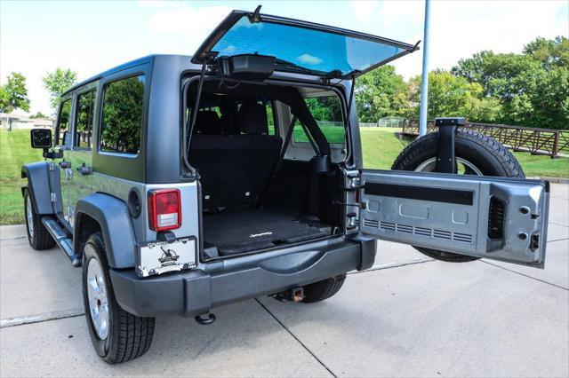 used 2014 Jeep Wrangler Unlimited car, priced at $17,500