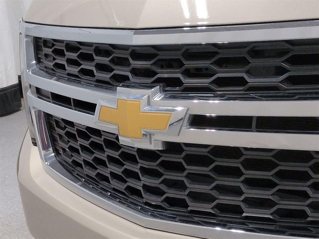 used 2015 Chevrolet Suburban car, priced at $15,000