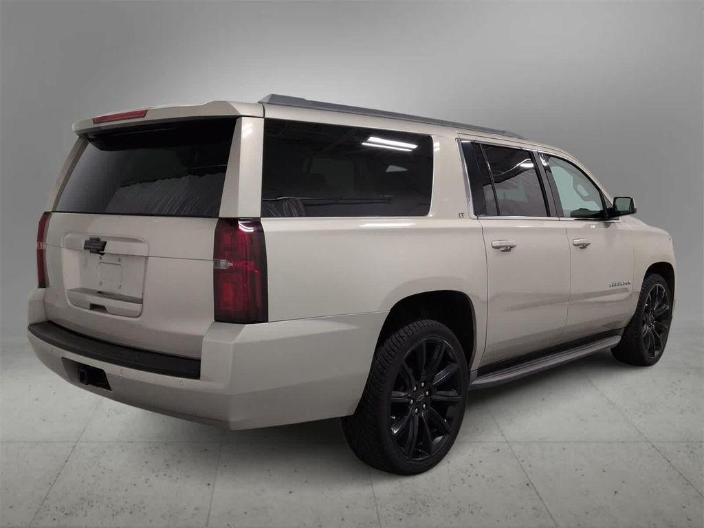 used 2015 Chevrolet Suburban car, priced at $15,000