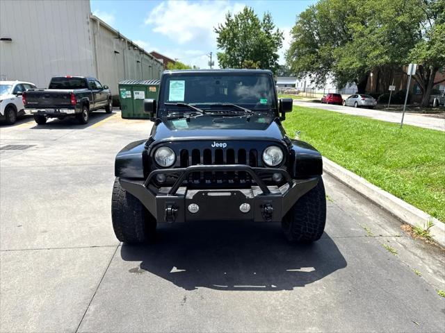 used 2014 Jeep Wrangler car, priced at $17,688