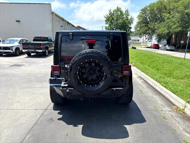 used 2014 Jeep Wrangler car, priced at $17,688