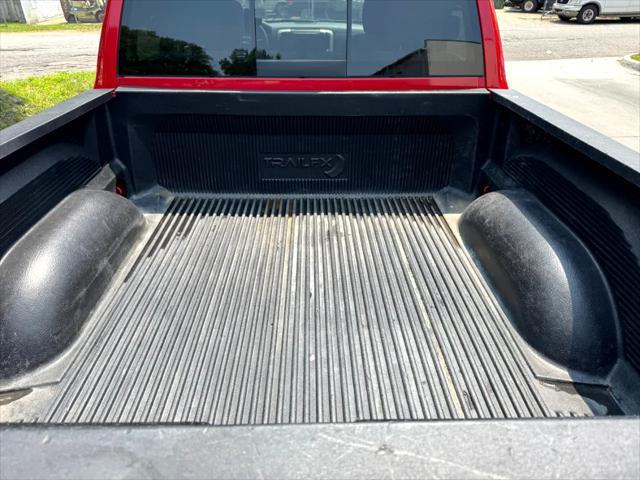 used 2019 Ram 1500 car, priced at $23,999