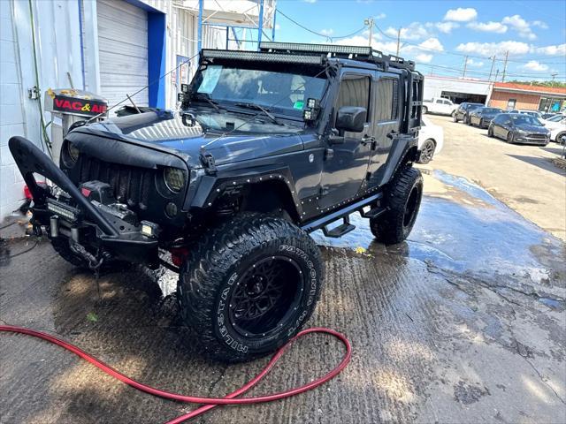 used 2016 Jeep Wrangler Unlimited car, priced at $22,788