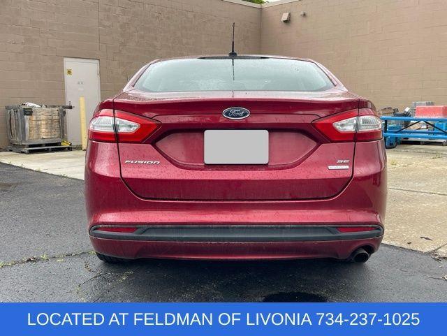 used 2014 Ford Fusion car, priced at $7,990