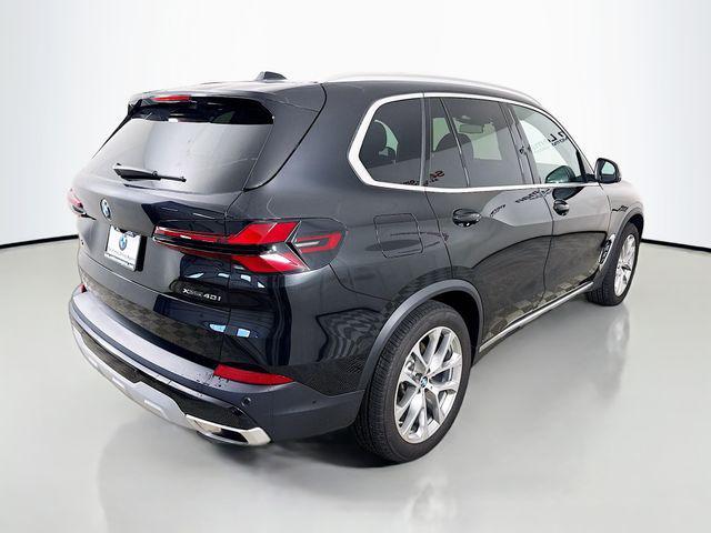 used 2024 BMW X5 car, priced at $65,594
