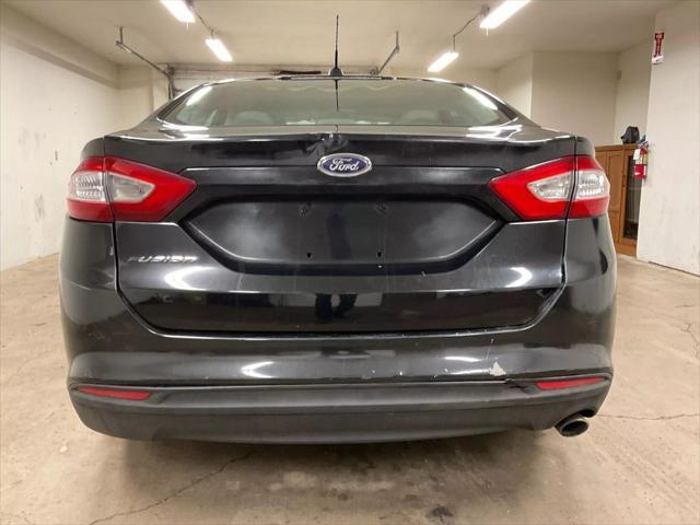 used 2014 Ford Fusion car, priced at $6,995