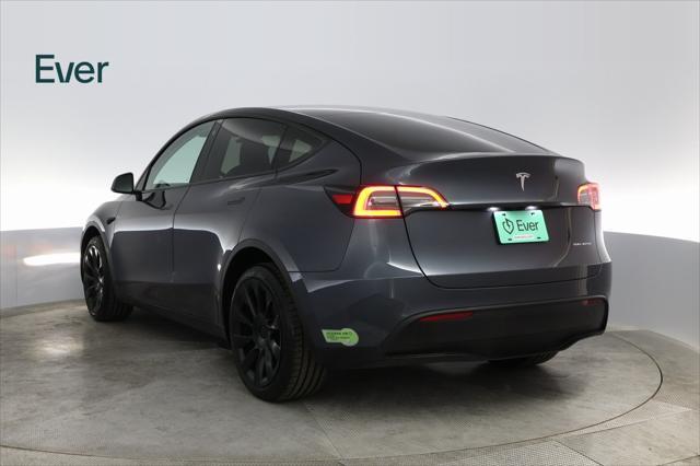 used 2023 Tesla Model Y car, priced at $33,699