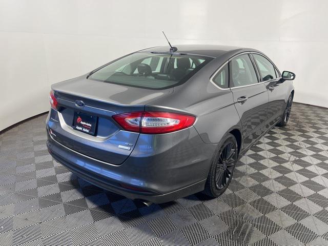 used 2014 Ford Fusion car, priced at $5,974