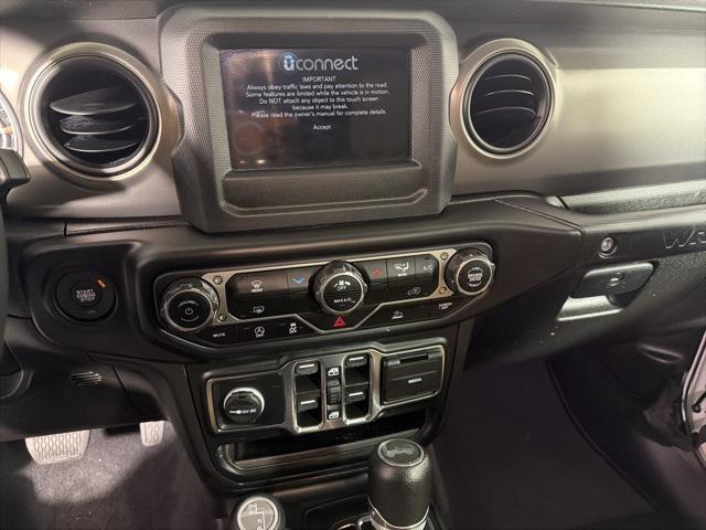 used 2023 Jeep Wrangler car, priced at $28,894