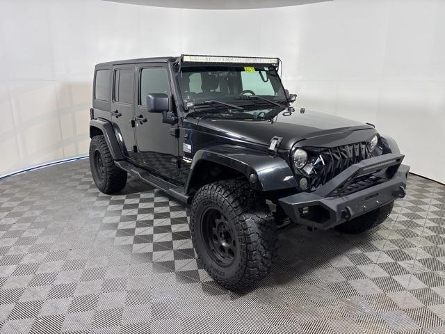 used 2012 Jeep Wrangler Unlimited car, priced at $11,999
