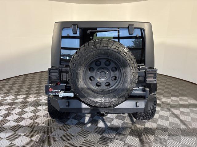 used 2012 Jeep Wrangler Unlimited car, priced at $11,999