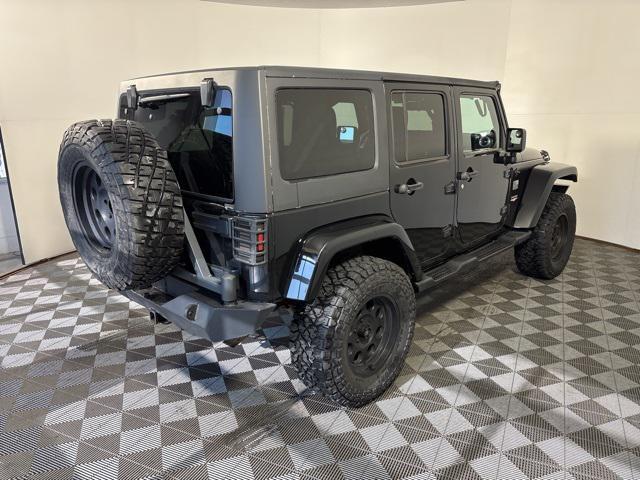used 2012 Jeep Wrangler Unlimited car, priced at $11,999
