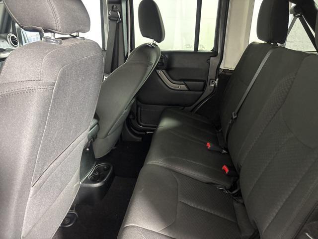 used 2018 Jeep Wrangler JK Unlimited car, priced at $23,443