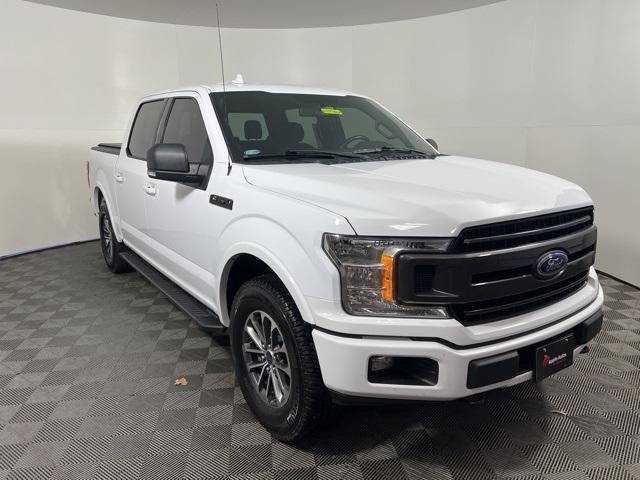 used 2018 Ford F-150 car, priced at $26,394