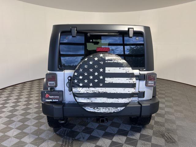 used 2012 Jeep Wrangler Unlimited car, priced at $13,414