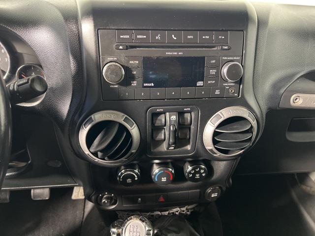 used 2012 Jeep Wrangler Unlimited car, priced at $13,414