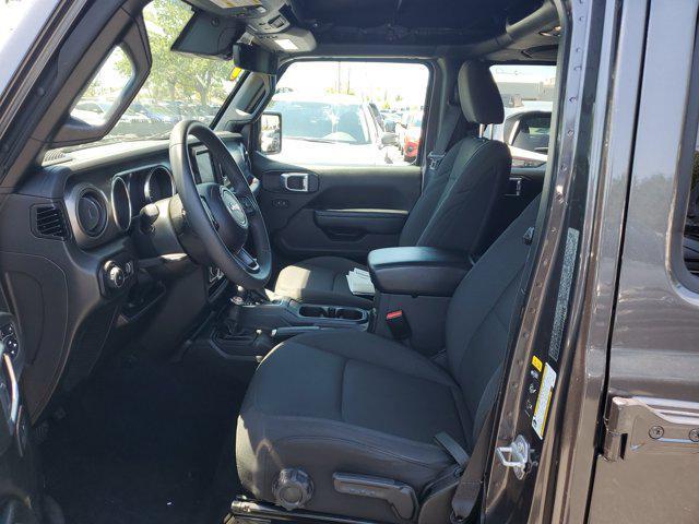 used 2023 Jeep Wrangler car, priced at $31,233