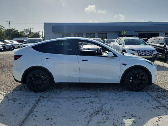 used 2023 Tesla Model Y car, priced at $29,674