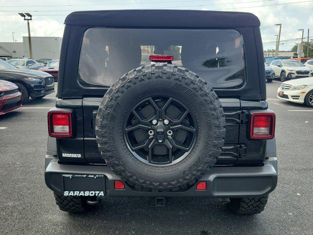 used 2024 Jeep Wrangler car, priced at $37,209
