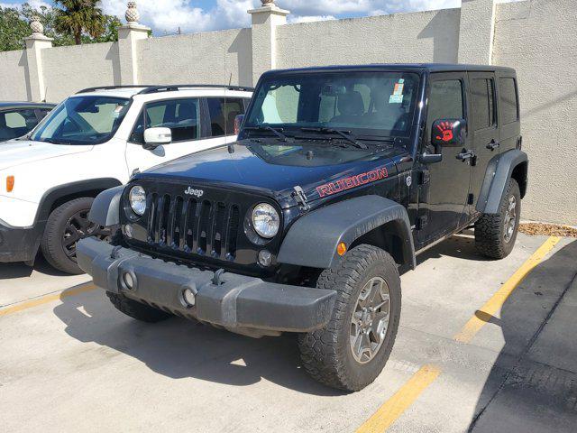 used 2014 Jeep Wrangler Unlimited car, priced at $23,995