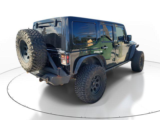 used 2011 Jeep Wrangler Unlimited car, priced at $10,895