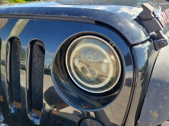 used 2011 Jeep Wrangler Unlimited car, priced at $10,895