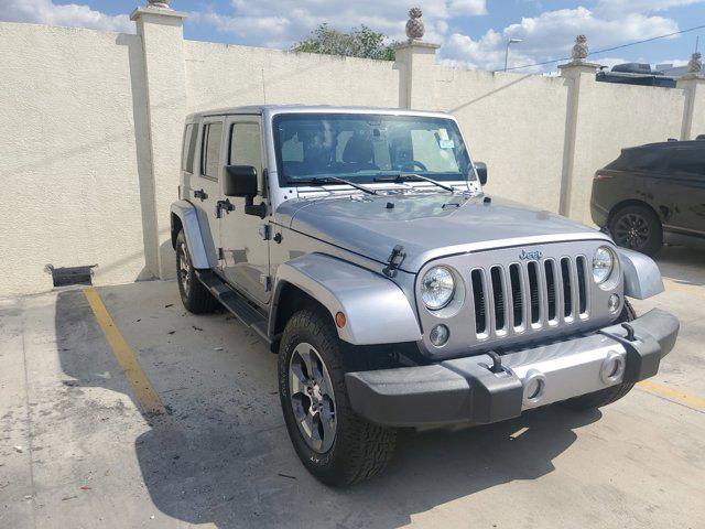 used 2016 Jeep Wrangler Unlimited car, priced at $21,938