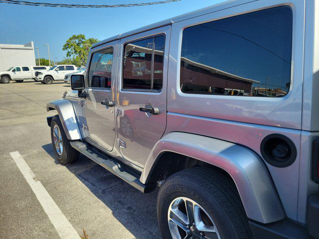used 2013 Jeep Wrangler Unlimited car, priced at $13,335