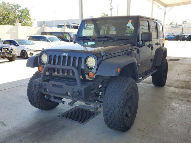 used 2011 Jeep Wrangler Unlimited car, priced at $17,499